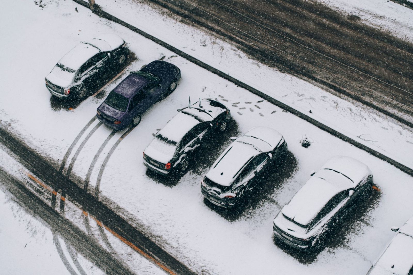 Snow-covered parking lot from above